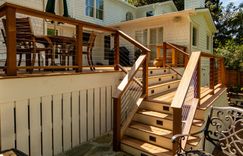 Back deck featuring outdoor accent lighting on the stairs. 